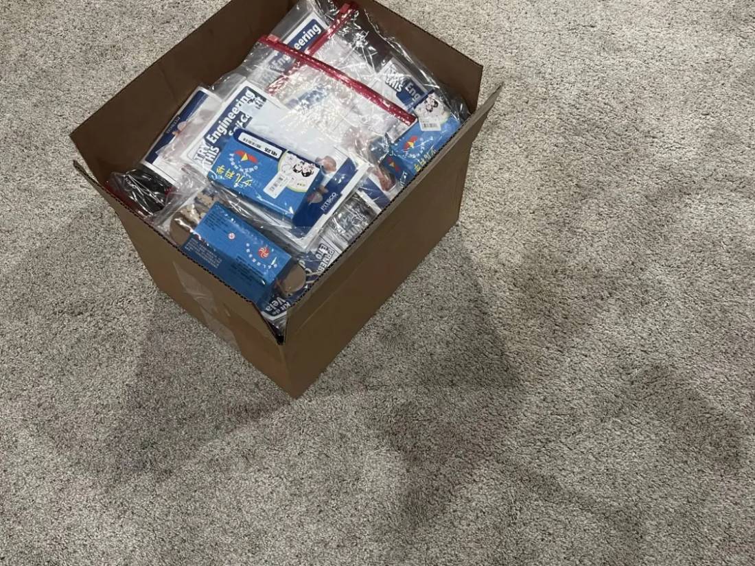 A box of finished kits ready for delivery
