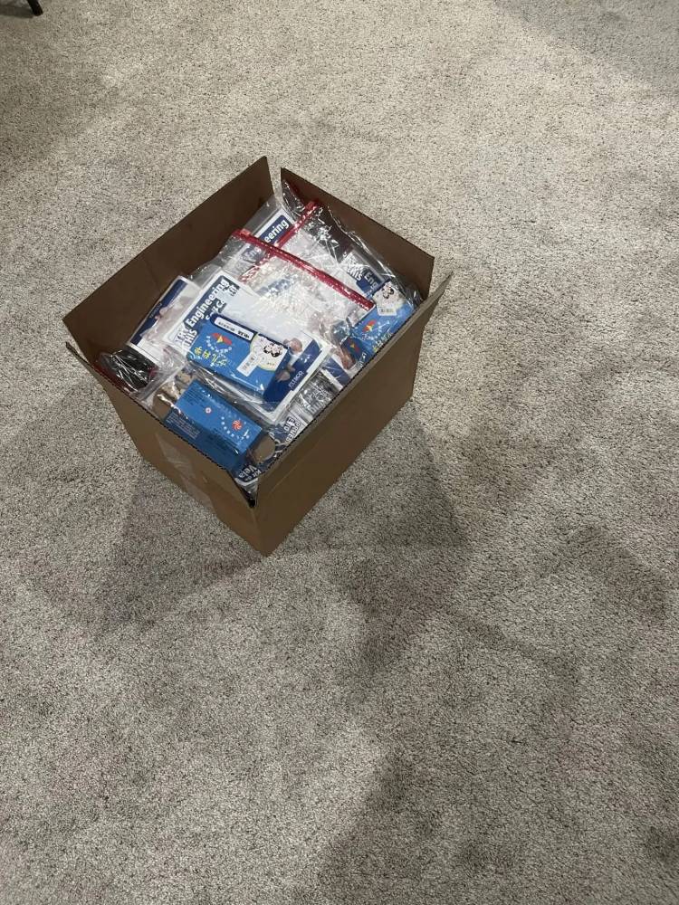 A box of finished kits ready for delivery