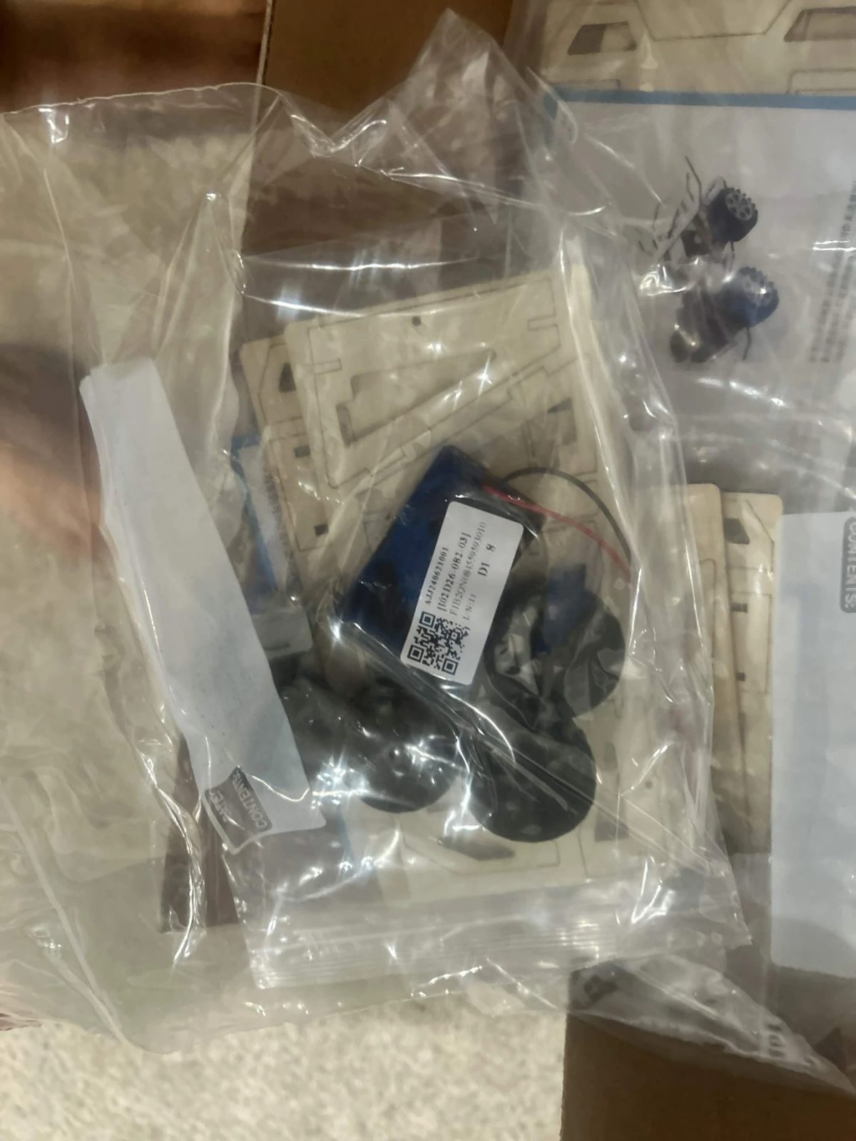 Parts and a motor sealed in a kit bag