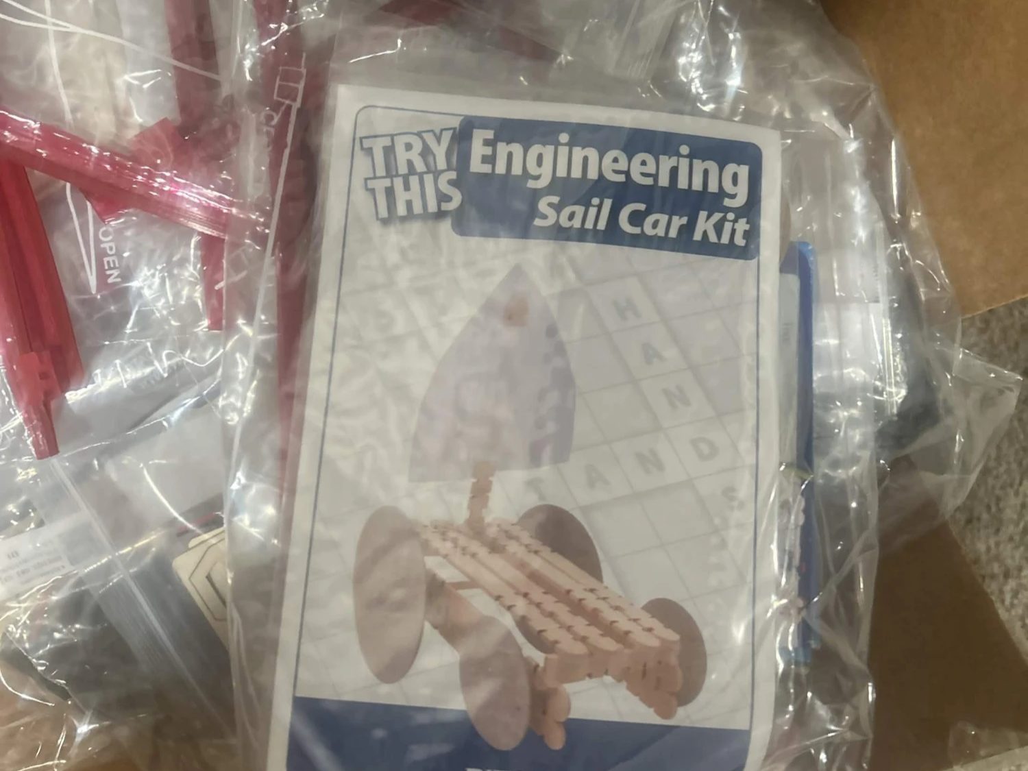 A sealed Future Spark kit with a sail car instruction card